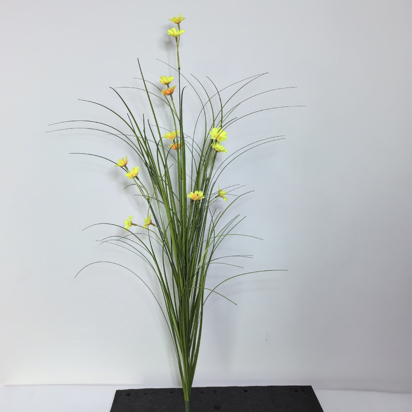 Artificial grass with flowers