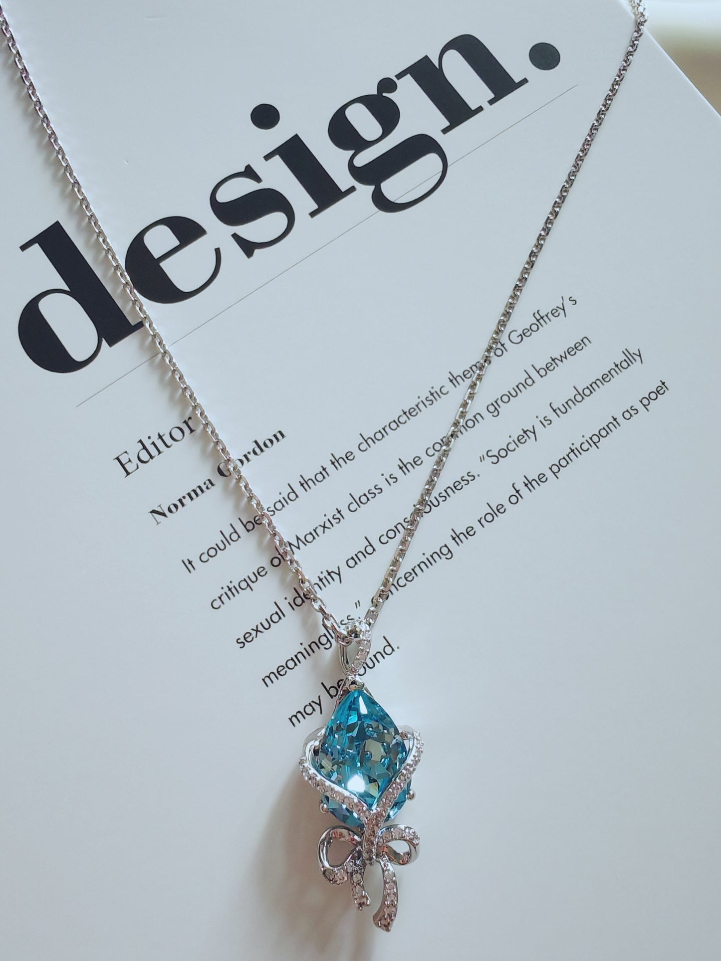 Elegant Blue Ribbon Crystal Pendant Necklace