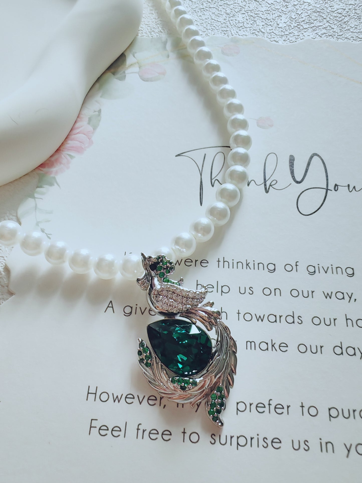 Elegant Pearl Necklace with Green Gemstone Phoenix Pendant