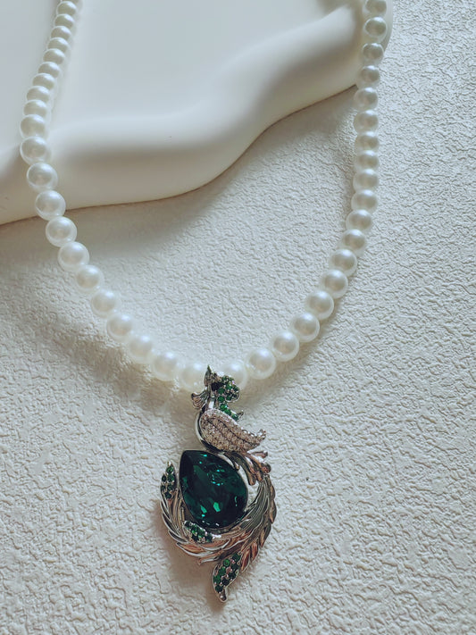 Elegant Pearl Necklace with Green Gemstone Phoenix Pendant