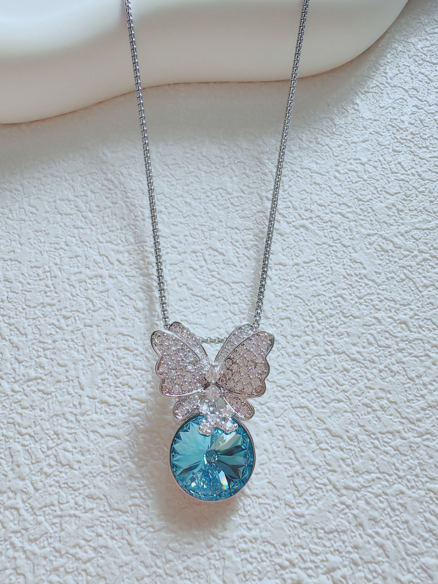 Crystal Butterfly Pendant Necklace with Blue Gemstone