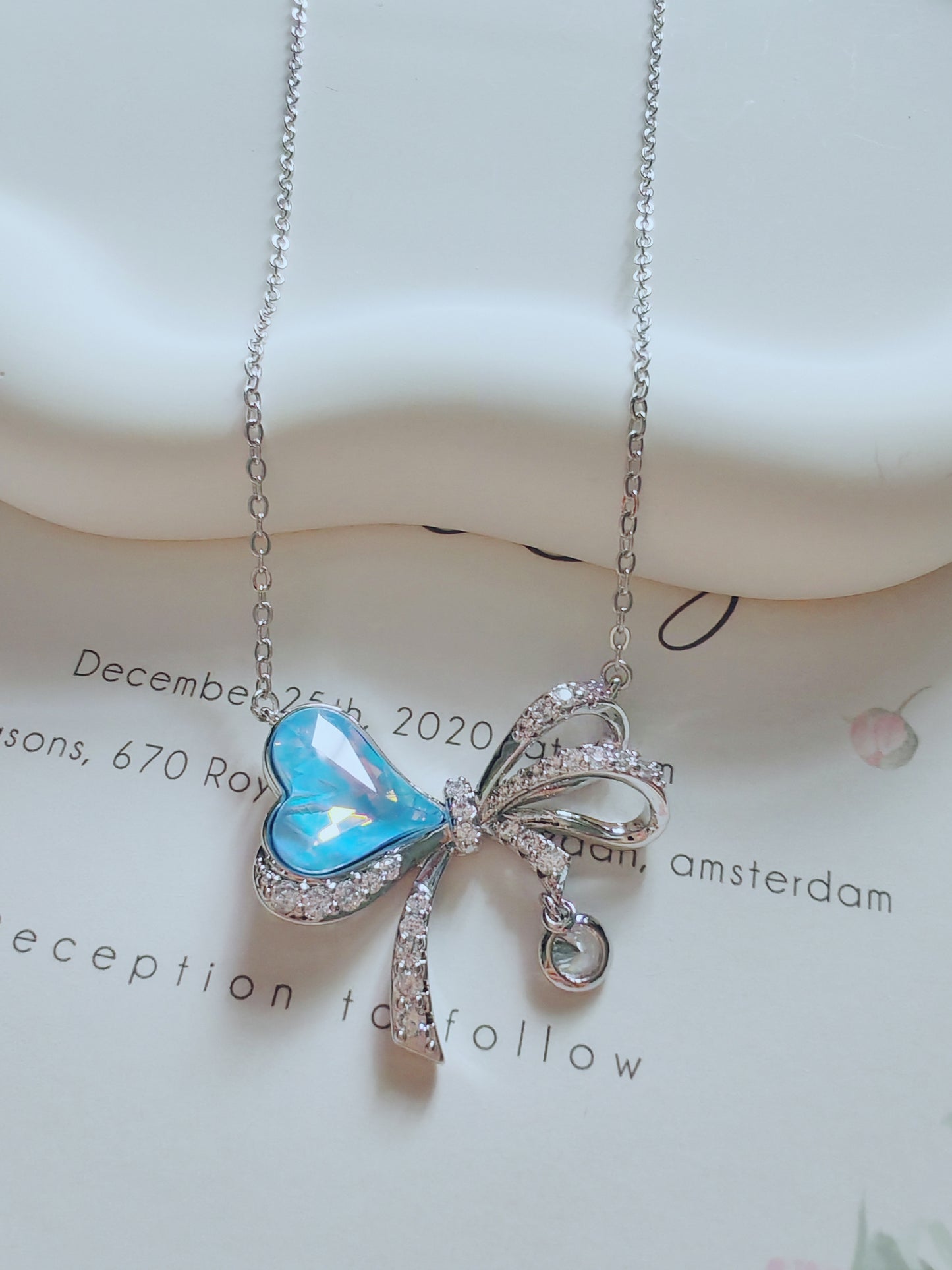 Sparkling Blue Heart Bow Necklace – Elegant Crystal Pendant Jewelry for Women
