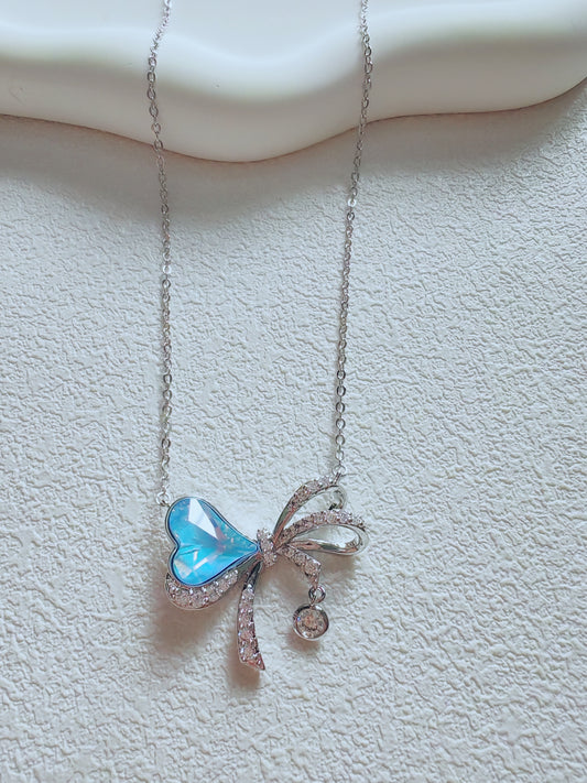 Sparkling Blue Heart Bow Necklace – Elegant Crystal Pendant Jewelry for Women