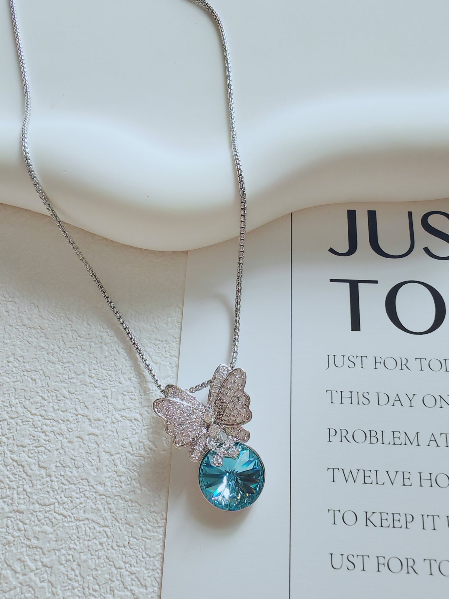 Crystal Butterfly Pendant Necklace with Blue Gemstone