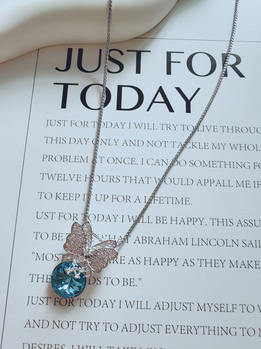 Crystal Butterfly Pendant Necklace with Blue Gemstone