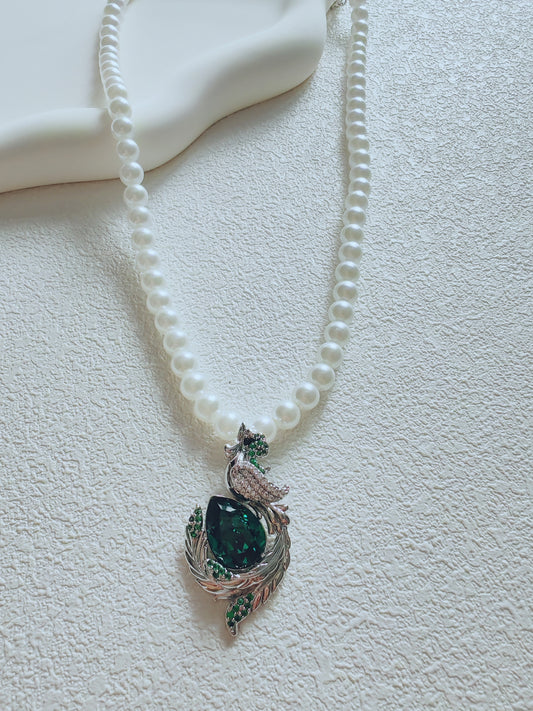 Elegant Pearl Necklace with Green Gemstone Phoenix Pendant