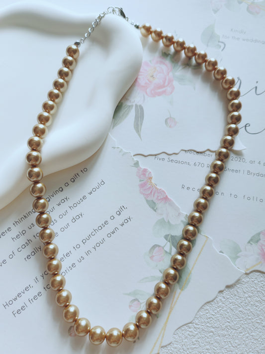 Golden Elegance Faux Pearl Necklace